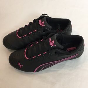 puma pink and black shoes
